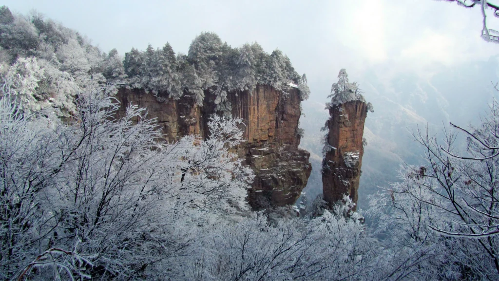 best time to visit zhangjiajie in winter with snow-covered sandstone peaks in Zhangjiajie National Forest Park