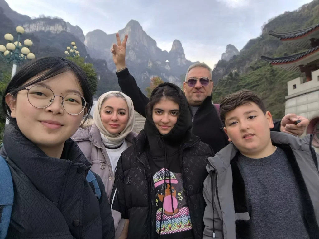 zhangjiajie city Muslim-friendly tour with HalalChinaTrips English guide and travelers at Tianmen Mountain