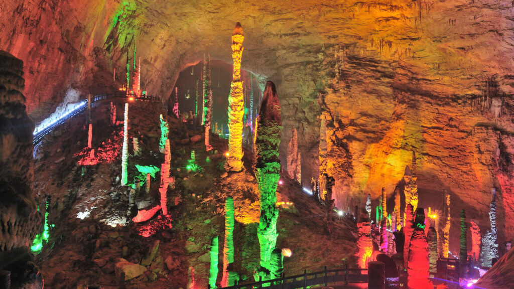 Zhangjiajie Huanglong Cave panoramic stalagmite hall with colorful cave lights