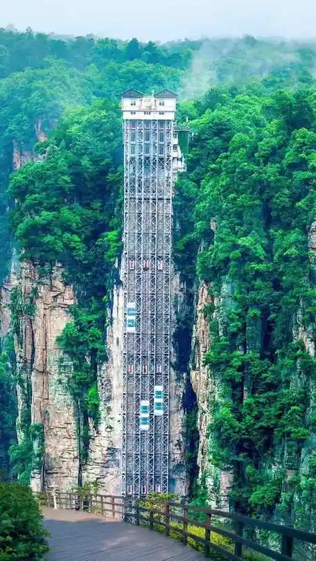 Scenic elevator route in Zhangjiajie National Forest Park with forested cliffs
