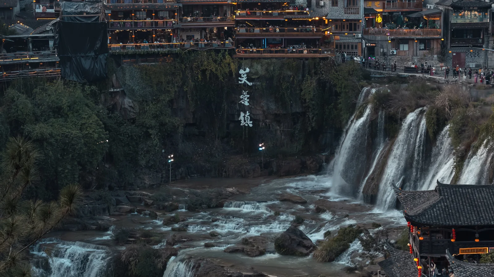 Furong Ancient Town waterfall night view for Zhangjiajie route planning