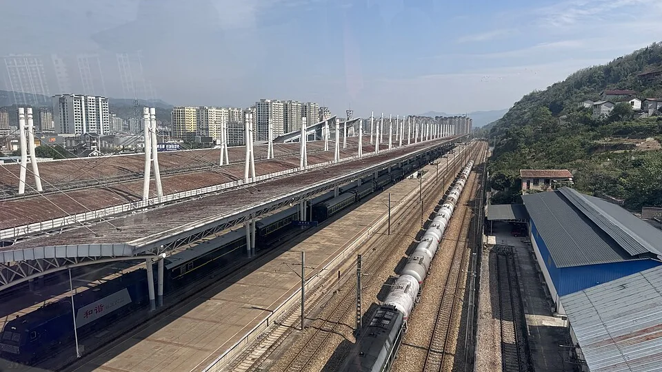 Kuala Lumpur to Zhangjiajie arrival and transfer planning with Zhangjiajie railway station view