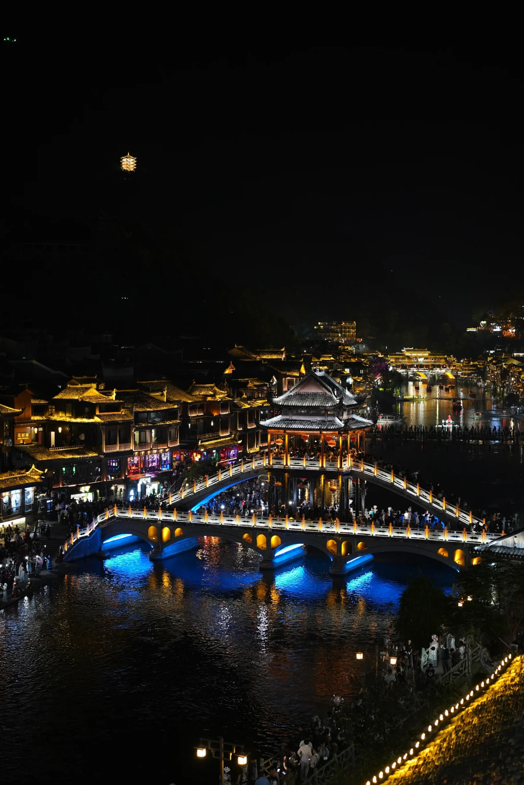 zhangjiajie to fenghuang ancient town night view by Tuojiang River and Red Bridge