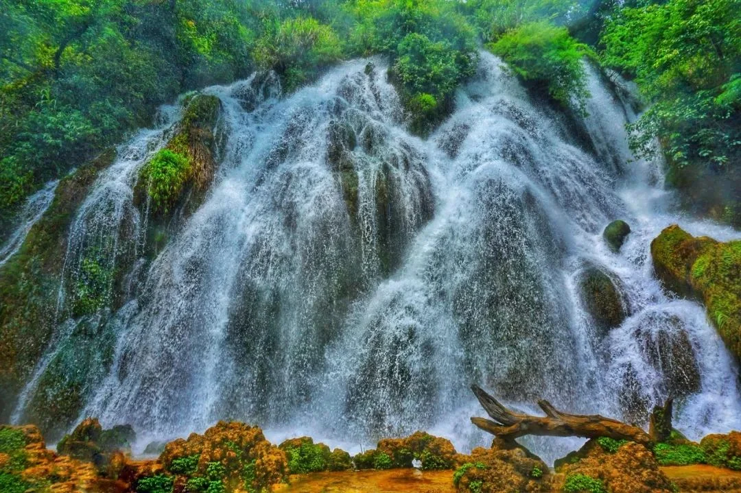 zhangjiajie in summer waterfall scene for rain and walking comfort planning