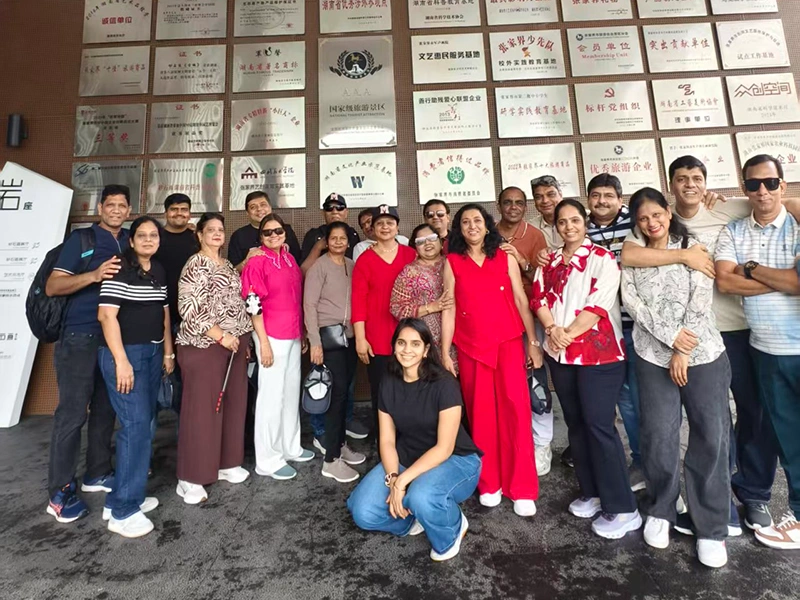 Aisha M. and family in Xiangxi