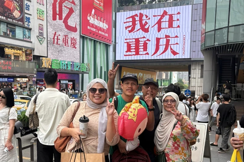 Family photo at Jiefangbei, Chongqing