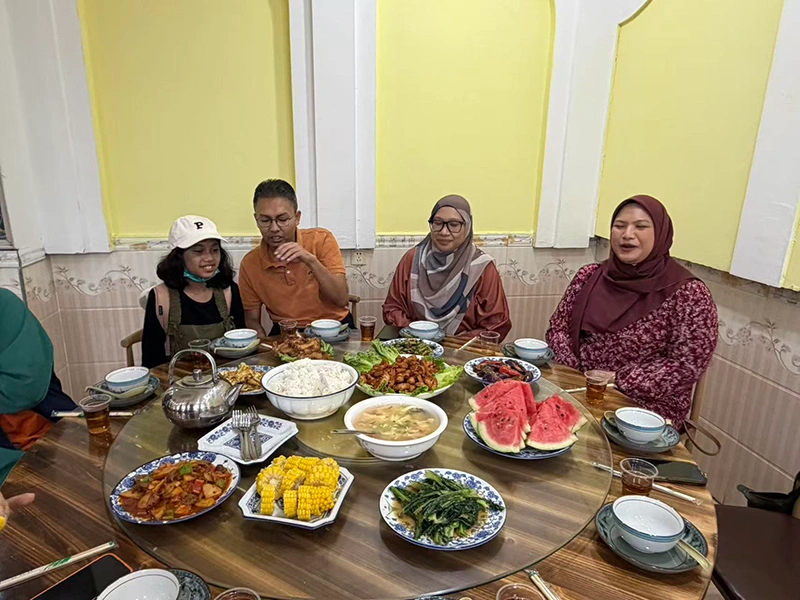 Yusuf T. and family in Xiangxi