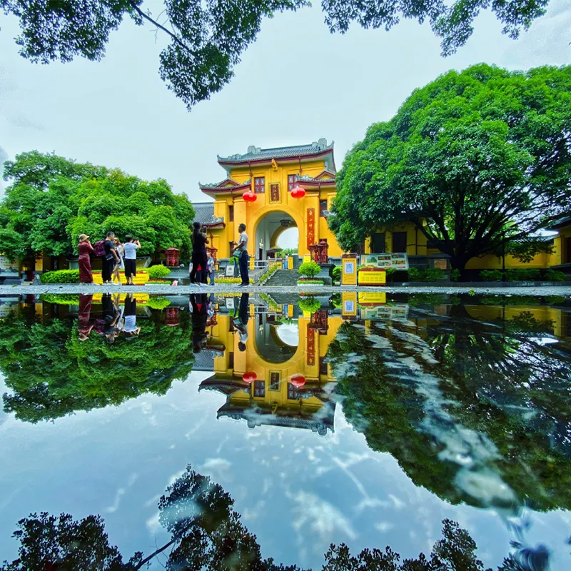 Duxiu Peak rising inside the walled Jingjiang Princes' City in Guilin
