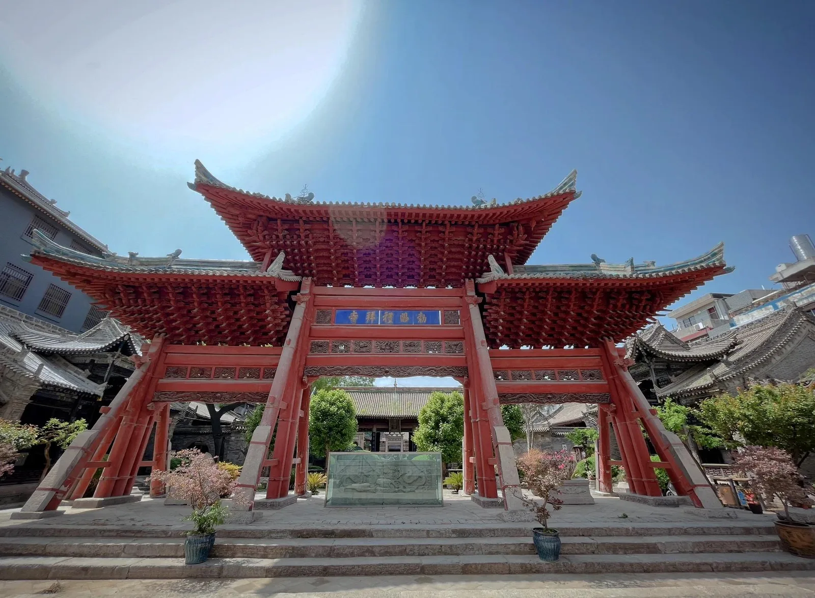 Red wooden pailou gate in the Chinese courtyard of the Great Mosque of Xi'an