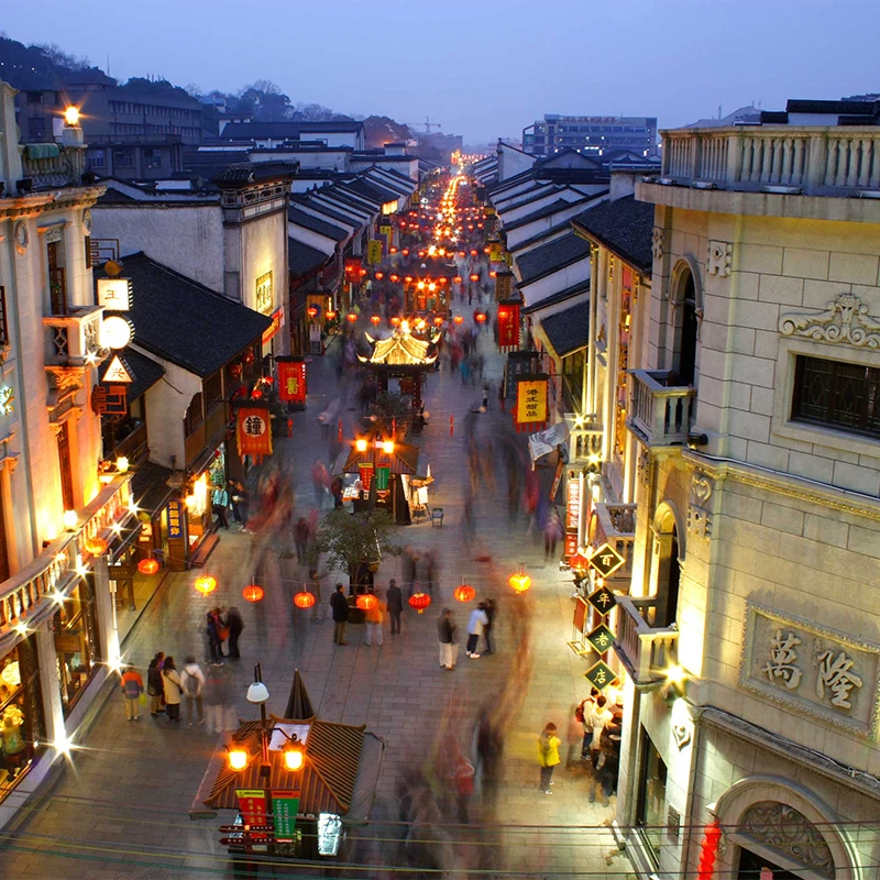Night crowds and old shopfronts on Hefang Street in Hangzhou