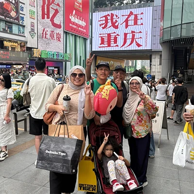 Nurul and family together during their China trip