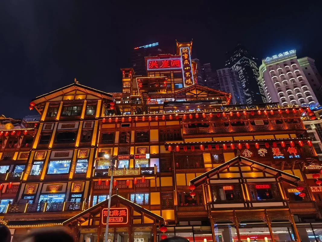 Hongyadong stilted houses glowing at night in Yuzhong District, Chongqing