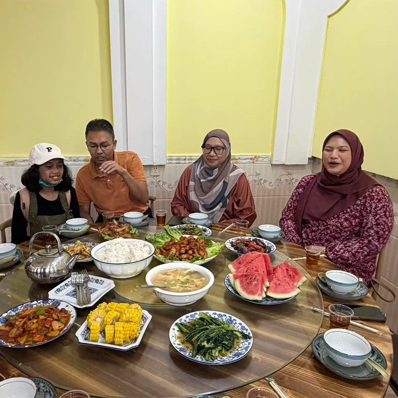 Muslim family sharing a halal dinner at a verified restaurant in Kunming