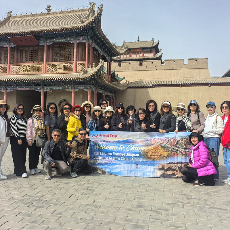 Muslim tour group at the Jiayuguan fortress on the Silk Road route from Lanzhou