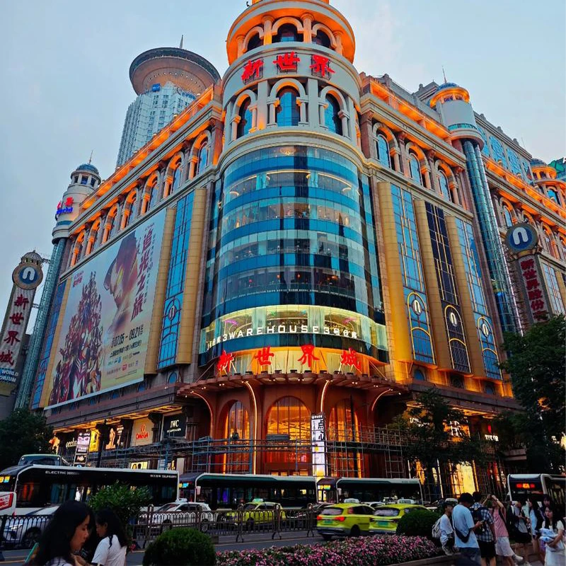 Neon signs and crowds on Nanjing Road pedestrian street, Shanghai