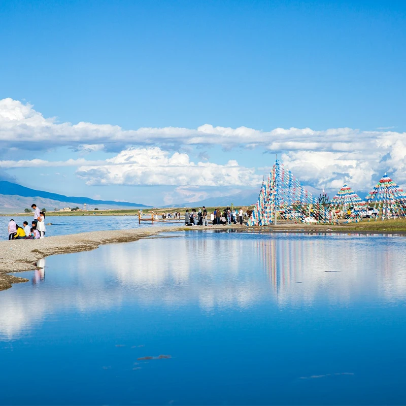 Qinghai Lake shore with prayer flags near Xining