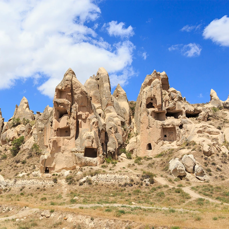 Stone City fortress ruins above the grassland in Tashkurgan