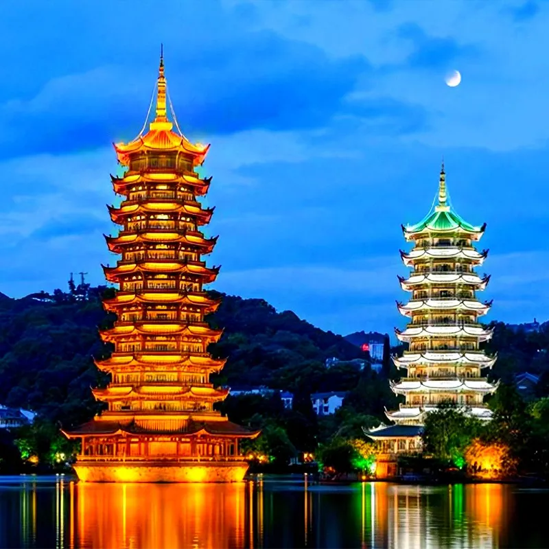Illuminated pagodas on the Two Rivers and Four Lakes night route in Guilin