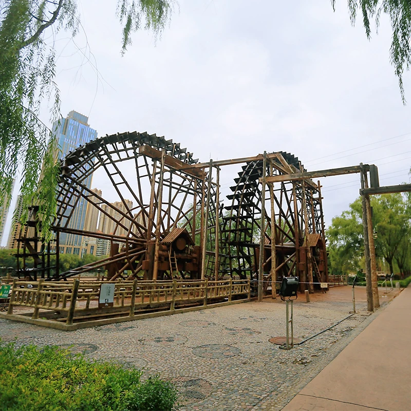 Giant wooden irrigation waterwheels at the Waterwheel Garden in Lanzhou