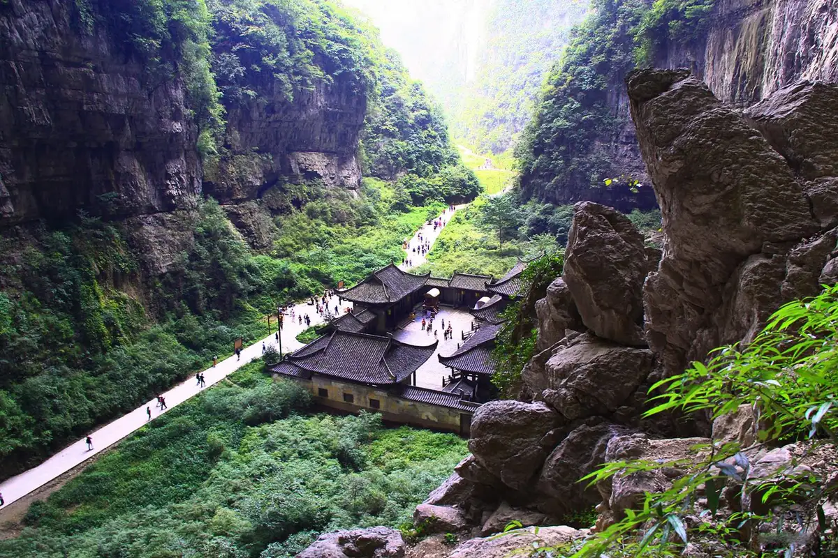 Ancient courtyard inn at the bottom of the Wulong Three Natural Bridges karst sinkhole near Chongqing