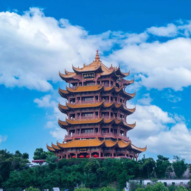 Yellow Crane Tower rising above the trees in Wuhan