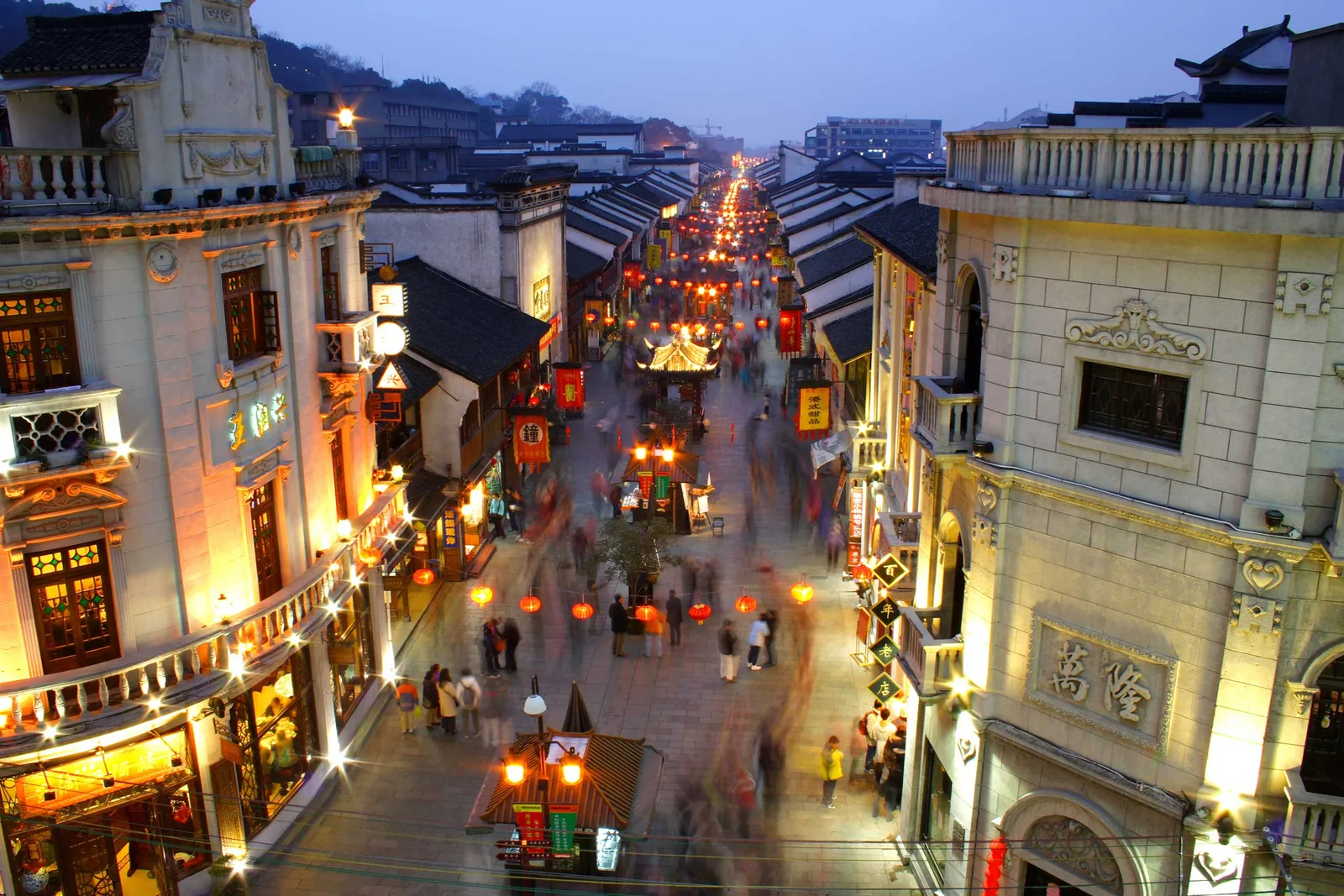 Hefang Street old town in Hangzhou at dusk with lanterns and evening crowds
