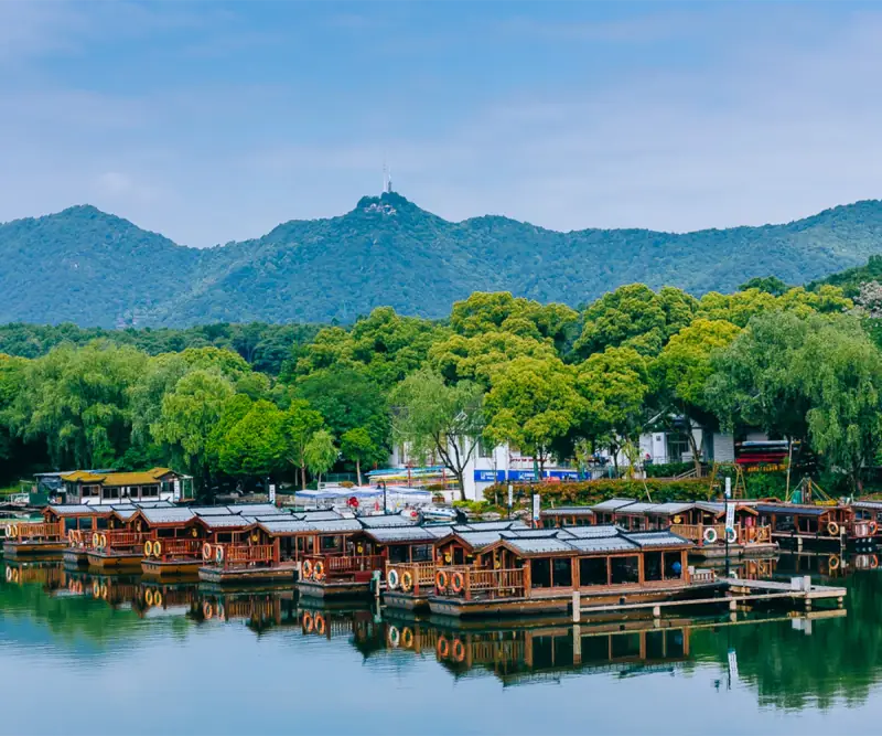 West Lake landscape with a pagoda and green hills in Hangzhou