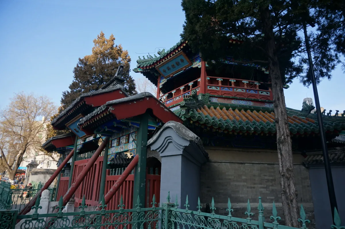 Niujie Mosque in Beijing seen from the street, with its Chinese palace-style tower and painted eaves