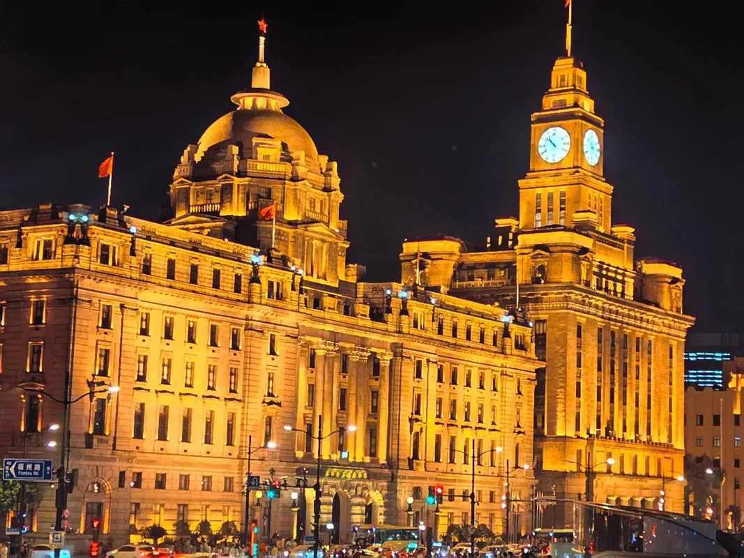 Historic Bund buildings lit up at night in Shanghai, the Day 1 evening stop of this Muslim itinerary