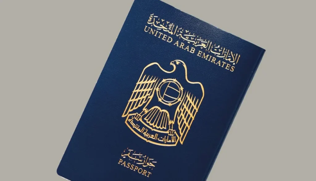 United Arab Emirates passport cover with gold eagle emblem on navy blue background